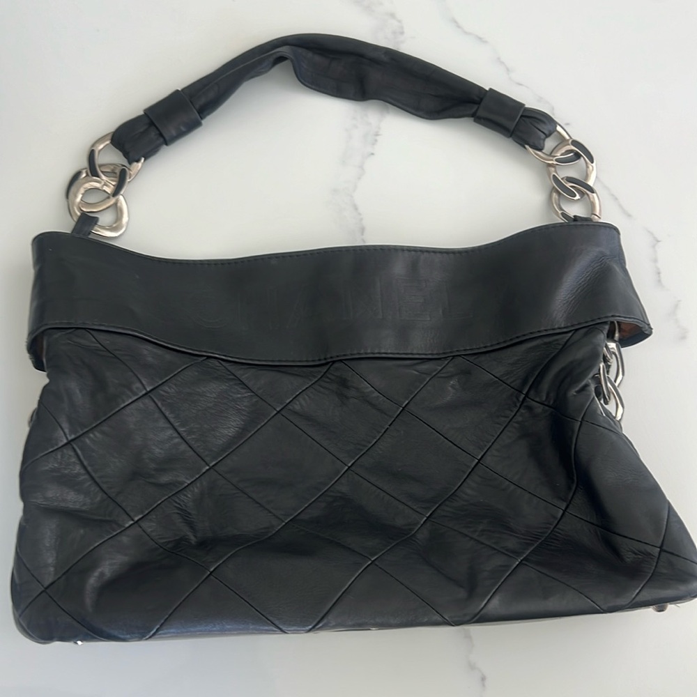 Chanel black quilted leather hobo bag